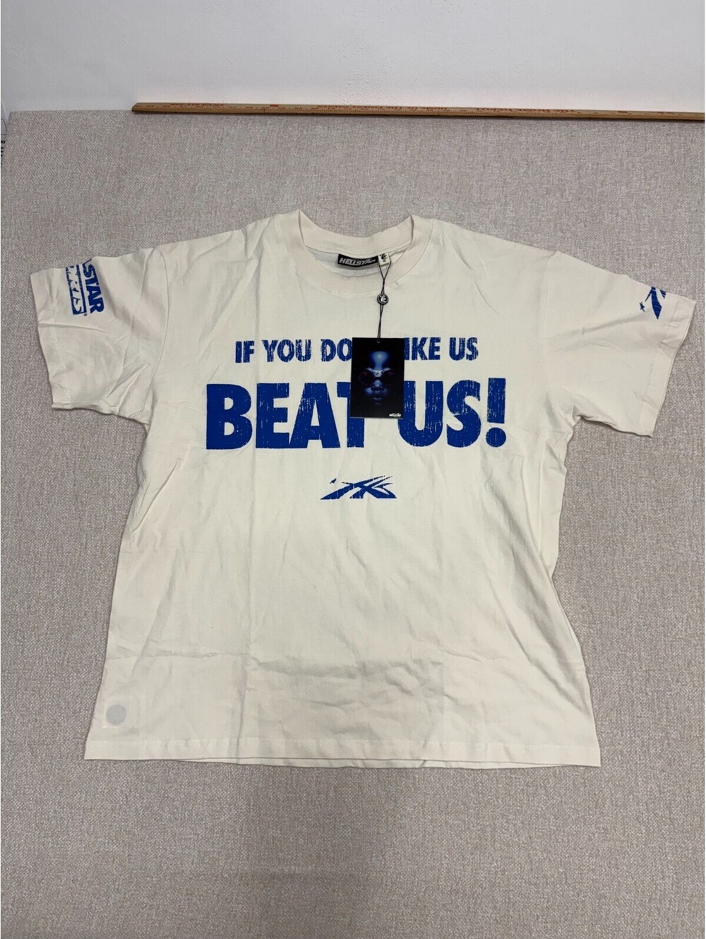 Hellstar Studios Men's Cream "Beat Us!" Blue Graphic T-Shirt Size L NWT